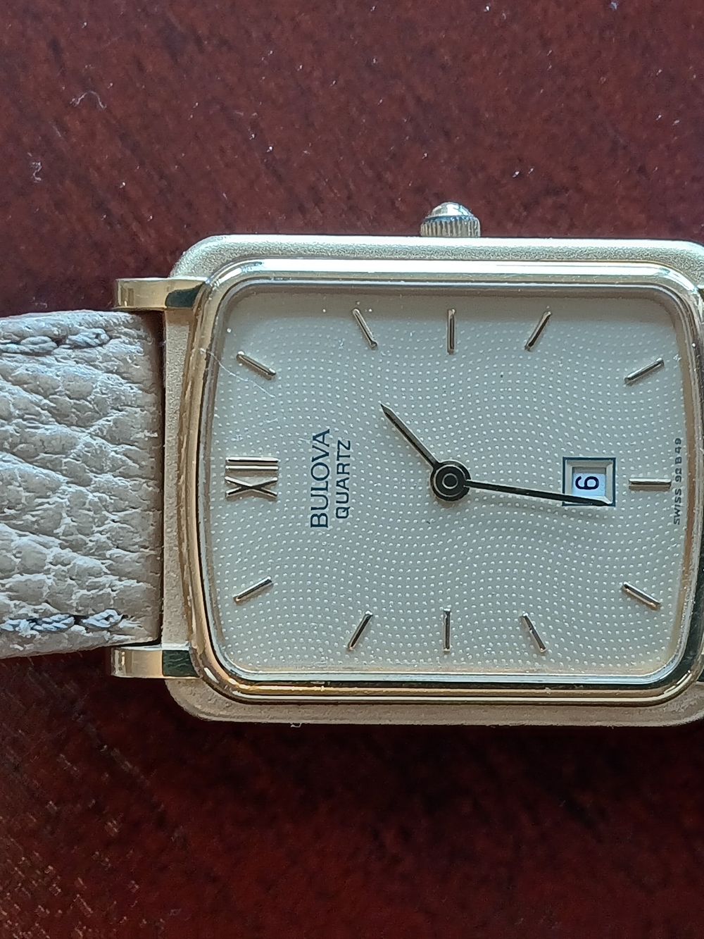 Bulova Quartz Tank Style . Gold-Tone Square Watch with Cream Leather Strap